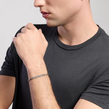 Bracciale con catena rolò e piastra FIRST