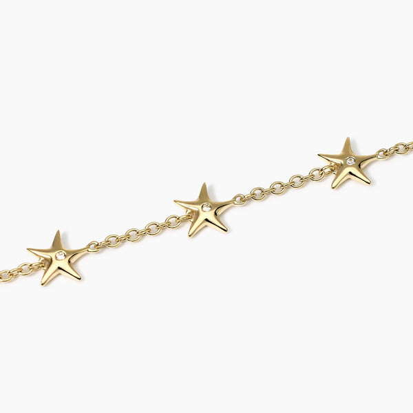 Bracciale dorato con ciondoli stella marina Style 18