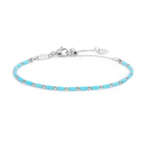 Bracciale con perline a tubo turchesi ed ematite