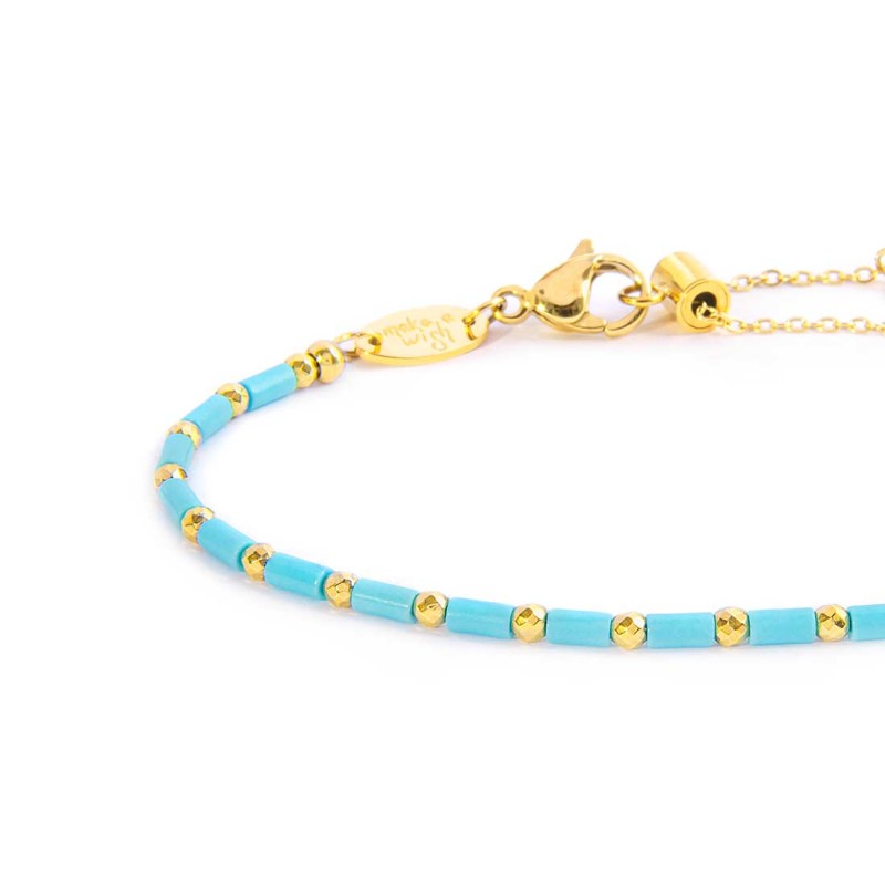 Bracciale con perline a tubo turchesi ed ematite