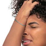 Bracciale con perline a tubo turchesi ed ematite