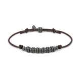 Bracciale cordino cerato rondelle in acciaio