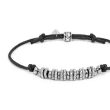 Bracciale cordino cerato rondelle in acciaio