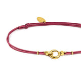 Bracciale cordino con moschettone ad anello centrale