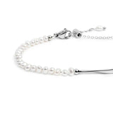 Bracciale semi rigido con tubolare twisted e catena con perle