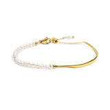 Bracciale semi rigido con tubolare twisted e catena con perle