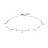 Cavigliera con zirconi e cuori pendenti bianchi