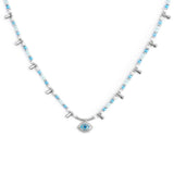 Collana con occhio pendente ed elementi di ematite sfacetttata