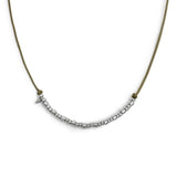 Collana cordino cerato elementi in acciaio e mini spike