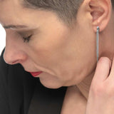 Orecchino pendente con catene snake quadrate